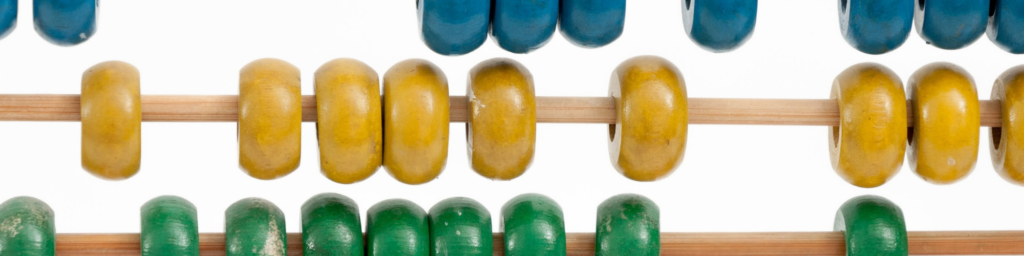 Colourful close up picture of a wooden amicus, colours you can see are. blue, yellow and green