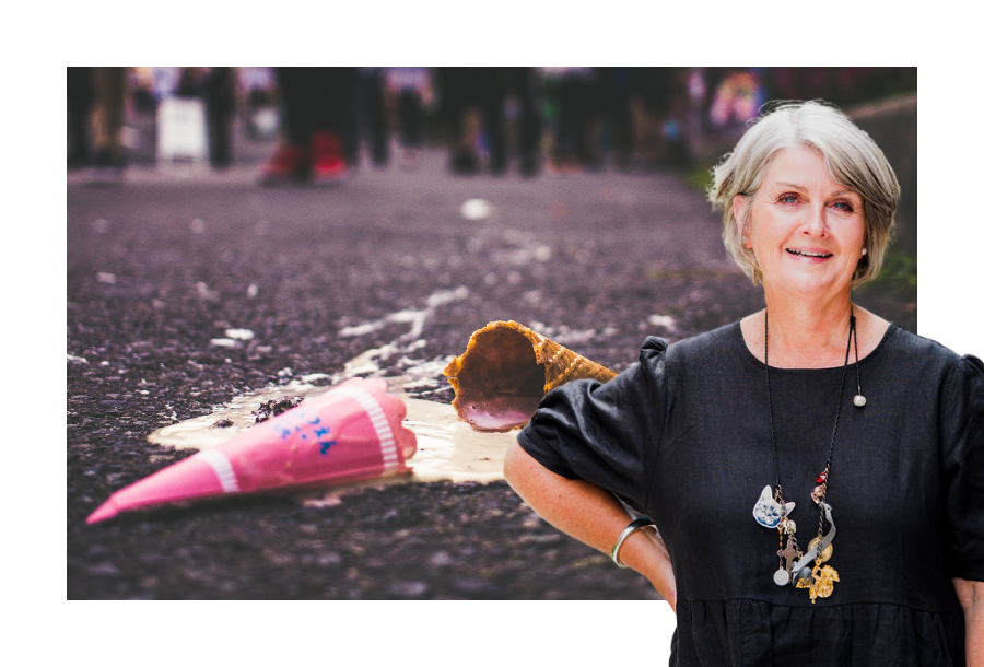 Pictured, our director Amanda Wilkens standing in front of a picture of an ice cream spilt over the bitumen road.