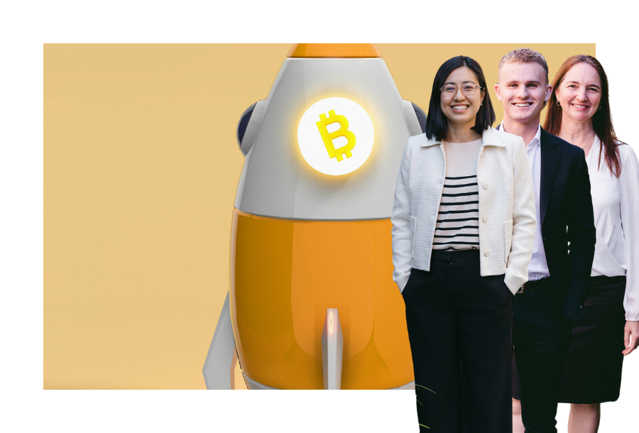 Pictured: Our Financial Advice team, Helen, Jayden and Sam standing smiling. Behind them is an image of a white and yellow simple rocket with the bitcoin glowing logo on it.